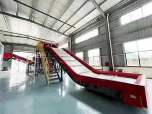 Transportador de placas articuladas