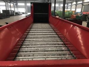 Transportador de placas articuladas